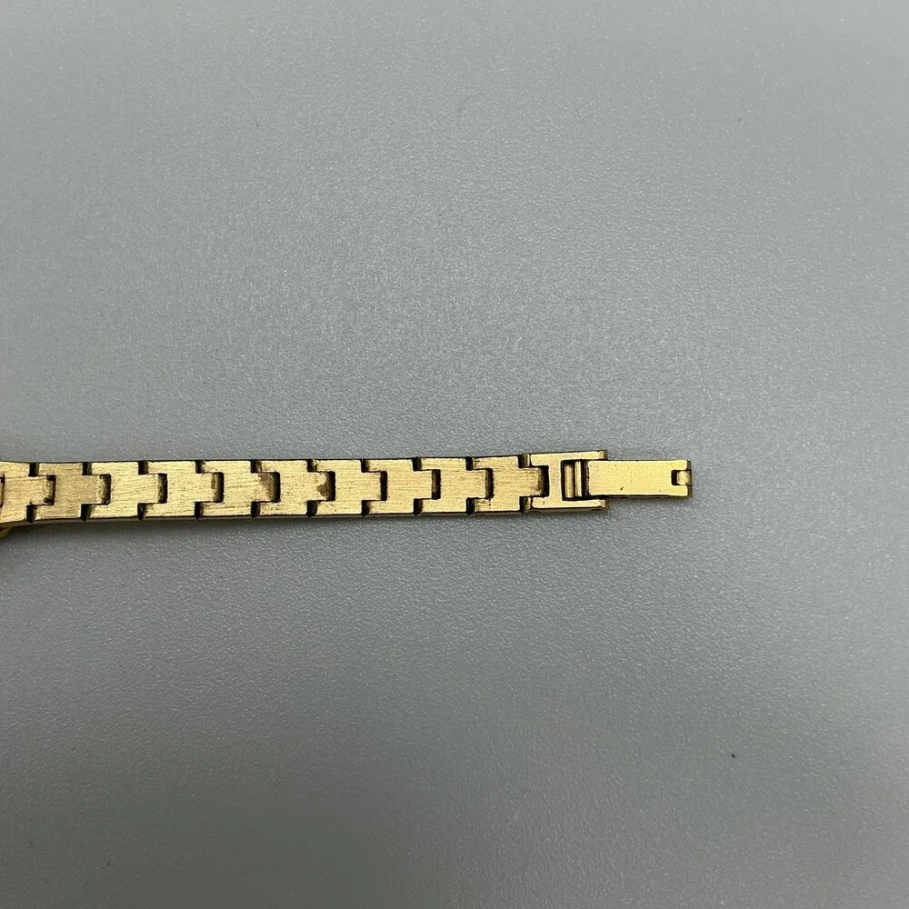 Geneva Womens Watch 16mm Champagne Dial Gold Tone Gemmed Blue Stones FOR PARTS
